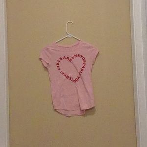 A cute girls justice shirt with a hearted quote